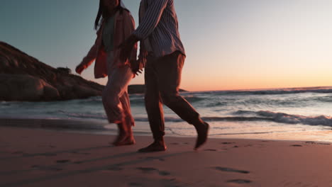 Closeup,-holding-hands-and-sunset-with-couple