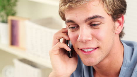 Close-up-of-young-man-using-mobile-phone