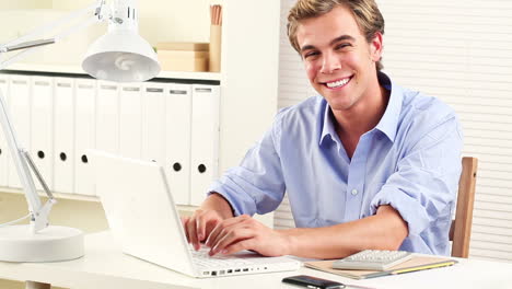 Young-businessman-working-from-home