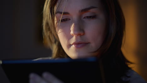 woman-using-tablet-computer-touchscreen-close-up