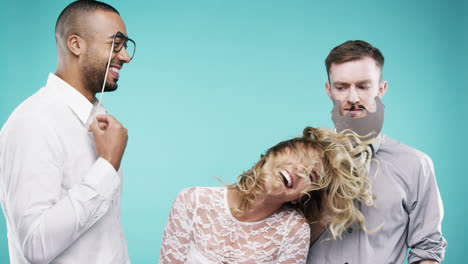 Drunk-blonde-woman-dancing-with-loser-men-slow-motion-party-photo-booth