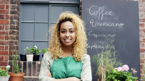 Mixed-race-barista-pretty-woman-portrait-outside-cafe