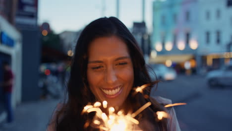 Beautiful-Indian-Woman-walking-with-sparkler-in-the-city