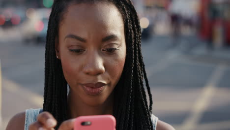 Slow-Motion-Portrait-of-beautiful-African-American-woman-using-smart-phone