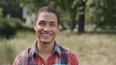 Slow-Motion-Portrait-of-happy-mixed-race-man-laughing