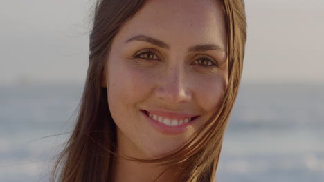Portrait-beautiful-young-woman-smiling-at-sunset-on-beach-brazilian-lady-enjoying-lifestyle-vacation