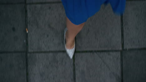woman-walking-on-sidewalk-wearing-elegant-evening-party-dress-stylish-glitter-shoes-strolling-in-urban-city-nightlife