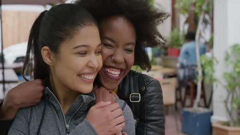 portrait-of-young-woman-suprise-hugging-friend-girlfriends-embracing-laughing-enjoying-togetherness-urban-youth-friendship-hang-out