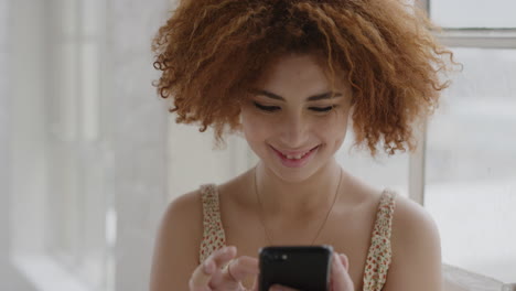 portrait-of-beautiful-young-woman-using-smartphone-texting-reading-messages-enjoying-mobile-phone-communication-mixed-race-female-afro-hairstyle