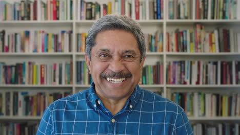 close-up-portrait-of-happy-mature-mixed-race-man-laughing-cheerful-in-library-bookcase-background-successful-senior-male-enjoying-relaxed-lifestyle