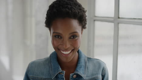 close-up-portrait-of-happy-african-american-woman-laughing-enjoying-lifestyle-success-looking-at-camera-wearing-denim-jacket