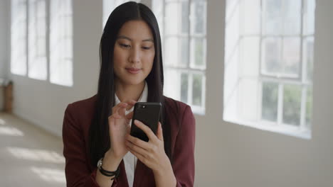 portrait-of-young-beautiful-asian-woman-texting-browsing-online-using-smartphone-mobile-technology-enjoying-digital-communication-connection