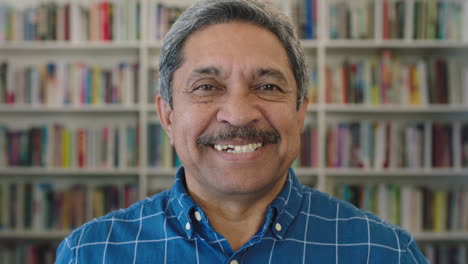 close-up-portrait-of-happy-mature-mixed-race-man-smiling-cheerful-in-library-bookshelf-background-successful-senior-male-enjoying-relaxed-lifestyle