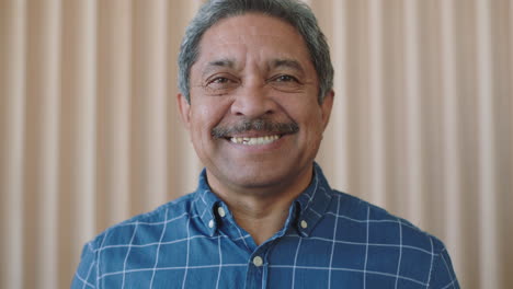 portrait-of-mature-mixed-race-man-smiling-confident-looking-at-camera-cheerful-retired-senior-enjoying-lifestyle