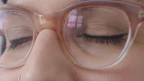 close-up-young-woman-eyes-smiling-happy-expression-looking-pensive-wearing-stylish-glasses-eye-care-concept