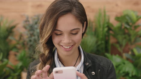 young-cute-hispanic-girl-portrait-of-beautiful-stylish-woman-happy-texting-browsing-using-smartphone-social-media-app-enjoying-mobile-communication