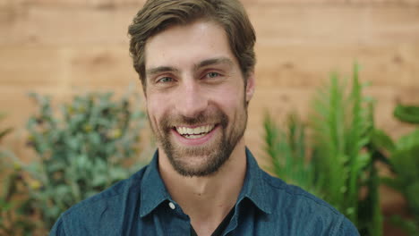 close-up-of-attractive-young-man-portrait-of-handsome-caucasian-guy-laughing-cheerful-at-camera