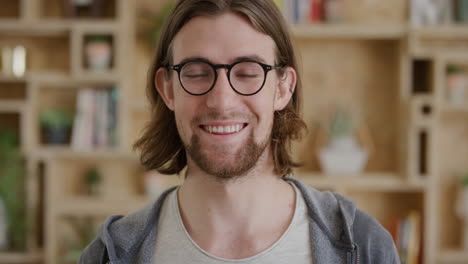 close-up-portrait-of-cute-young-man-smiling-happy-student-enjoying-success-geek-wearing-glasses-looking-at-camera-real-people-series