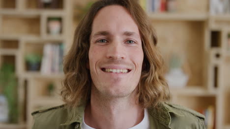 close-up-portrait-of-happy-young-man-smiling-enjoying-relaxed-lifestyle-handsome-caucasian-male-with-long-hair-real-people-series