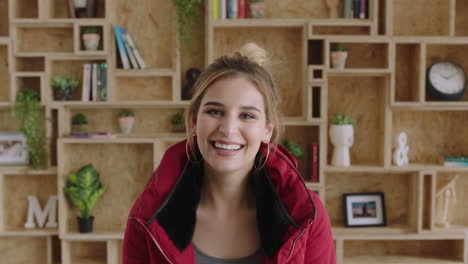 portrait-of-lovely-young-woman-wearing-red-jacket-laughing-cheerful-feeling-motivated