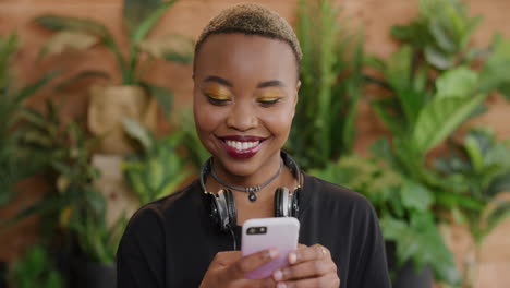 portrait-of-beautiful-african-american-woman-student-using-smartphone-enjoying-texting-online-social-media-messaging-on-mobile-phone-digital-communication-teenage-millennial