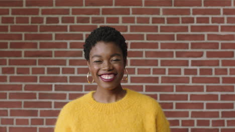 beautiful-portrait-of-independent-african-american-woman-laughing-cheerful-excited-wearing-yellow-jersey