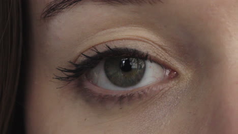 close-up-woman-eye-blinking-looking-at-camera-optical-beauty