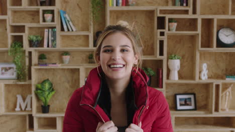 portrait-of-lovely-young-woman-wearing-red-jacket-laughing-cheerful-feeling-motivated