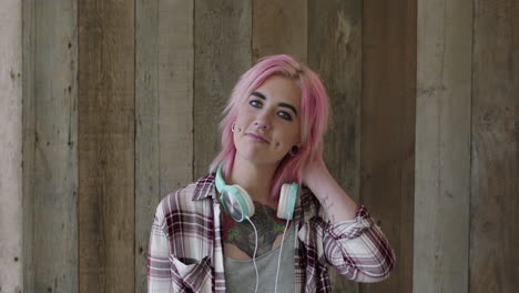 young-punk-girl-portrait-of-caucasian-woman-with-pink-hairstyle-looking-confident-at-camera-independent-urban-female