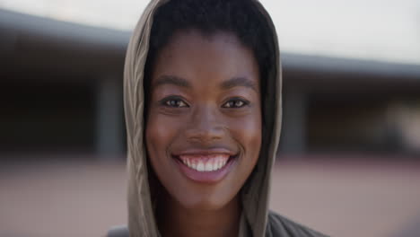 close-up-portrait-beautiful-young-african-american-woman-smiling-happy-wearing-hood-enjoying-independent-urban-lifestyle-real-people-series