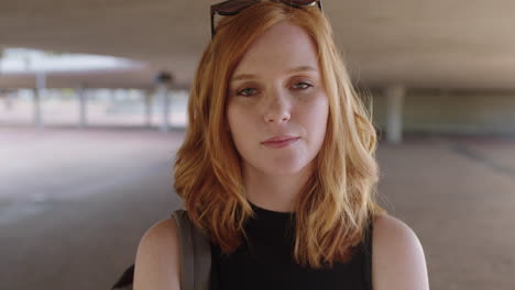 portrait-of-young-red-head-woman-looking-to-camera-disappointed-sad