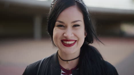 close-up-portrait-happy-young-caucasian-woman-smiling-cheerful-looking-at-camera-wearing-red-lipstick-slow-motion