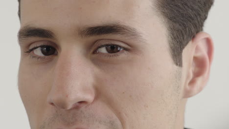 close-up-attractive-young-hispanic-man-face-smiling-looking-happy-satisfaction