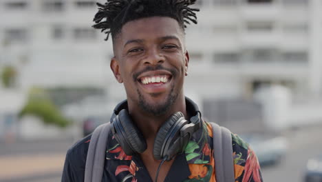 portrait-attractive-african-american-man-laughing-cheerful-black-tourist-enjoying-summer-vacation-travel-looking-relaxed-funky-hairstyle-slow-motion