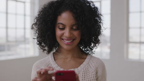 close-up-pretty-mixed-race-woman-portrait-of-beautiful-hispanic-girl-texting-browsing-using-smartphone-social-media-technology-enjoying-new-apartment-lifestyle-change