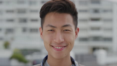 close-up-portrait-happy-young-asian-man-tourist-smiling-enjoying-summer-vacation-independent-teenage-male-looking-cheerful-real-people-series