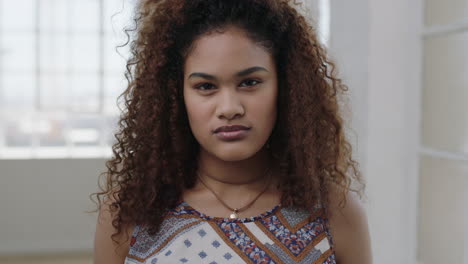 cute-young-woman-portrait-of-pretty-mixed-race-girl-looking-bored-disappointed-at-camera-unhappy-female-frizzy-hair