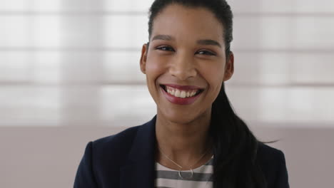 portrait-of-young-professional-mixed-race-business-woman-smiling-happy-looking-at-camera-ambitious-female-executive-close-up