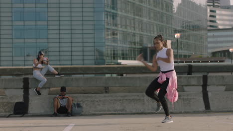 dancing-woman-young-hip-hop-dancer-performing-freestyle-moves-multi-ethnic-friends-watching-enjoying-urban-dance-practice-using-smartphone-taking-video-sharing-on-social-media