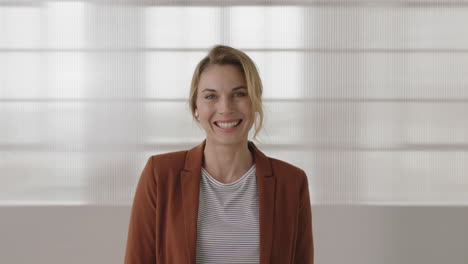 stylish-business-woman-portrait-of-attractive-blonde-executive-laughing-cheerful-looking-at-camera