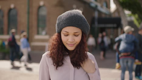 portrait-of-pretty-mixed-race-girl-looking-lonely-unhappy-feeling-shy-wearing-beanie-hat-urban-background