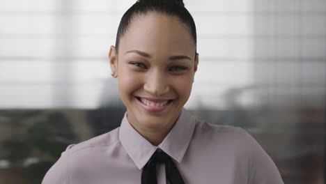 portrait-of-beautiful-young-mixed-race-business-woman-intern-smiling-happy-looking-at-camera-enjoying-corporate-job-opportunity