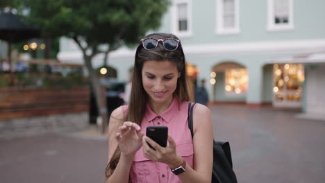 slow-motion-portrait-of-young-beautiful-woman-smiling-happy-texting-using-smartphone-social-media-app