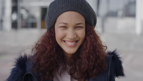 portrait-cute-young-mixed-race-woman-laughing-enjoying-successful-urban-lifestyle-happy-female-student-excited-on-college-campus-in-city-slow-motion