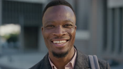 close-up-portrait-happy-african-american-businessman-laughing-enjoying-successful-lifestyle-professional-black-entrepreneur-in-city-at-sunset-slow-motion