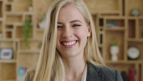 close-up-portrait-of-attractive-young-blonde-business-executive-laughing-confident-successful-independend-woman