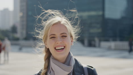 portrait-beautiful-young-blonde-woman-student-laughing-enjoying-happy-urban-lifestyle-sunny-day-in-city-cheerful-caucasian-female-wearing-scarf