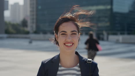 portrait-beautiful-young-business-woman-intern-laughing-enjoying-professional-urban-lifestyle-in-city-slow-motion