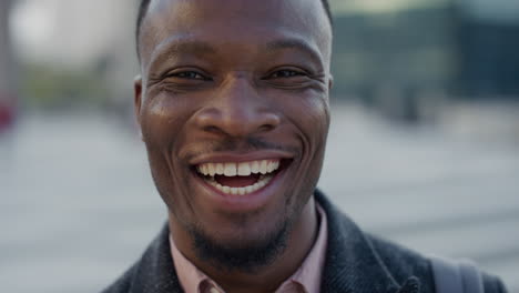 close-up-portrait-happy-african-american-businessman-laughing-enjoying-successful-lifestyle-professional-black-entrepreneur-looking-cheerful-at-camera