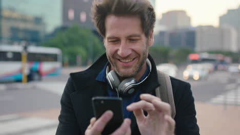 slow-motion-portrait-of-attractive-caucasian-man-in-busy-city-street-texting-browsing-using-smartphone-mobile-app-urban-commuting